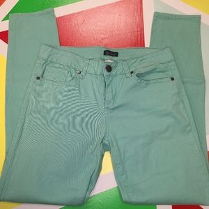 Red camel mint green skinny jeans